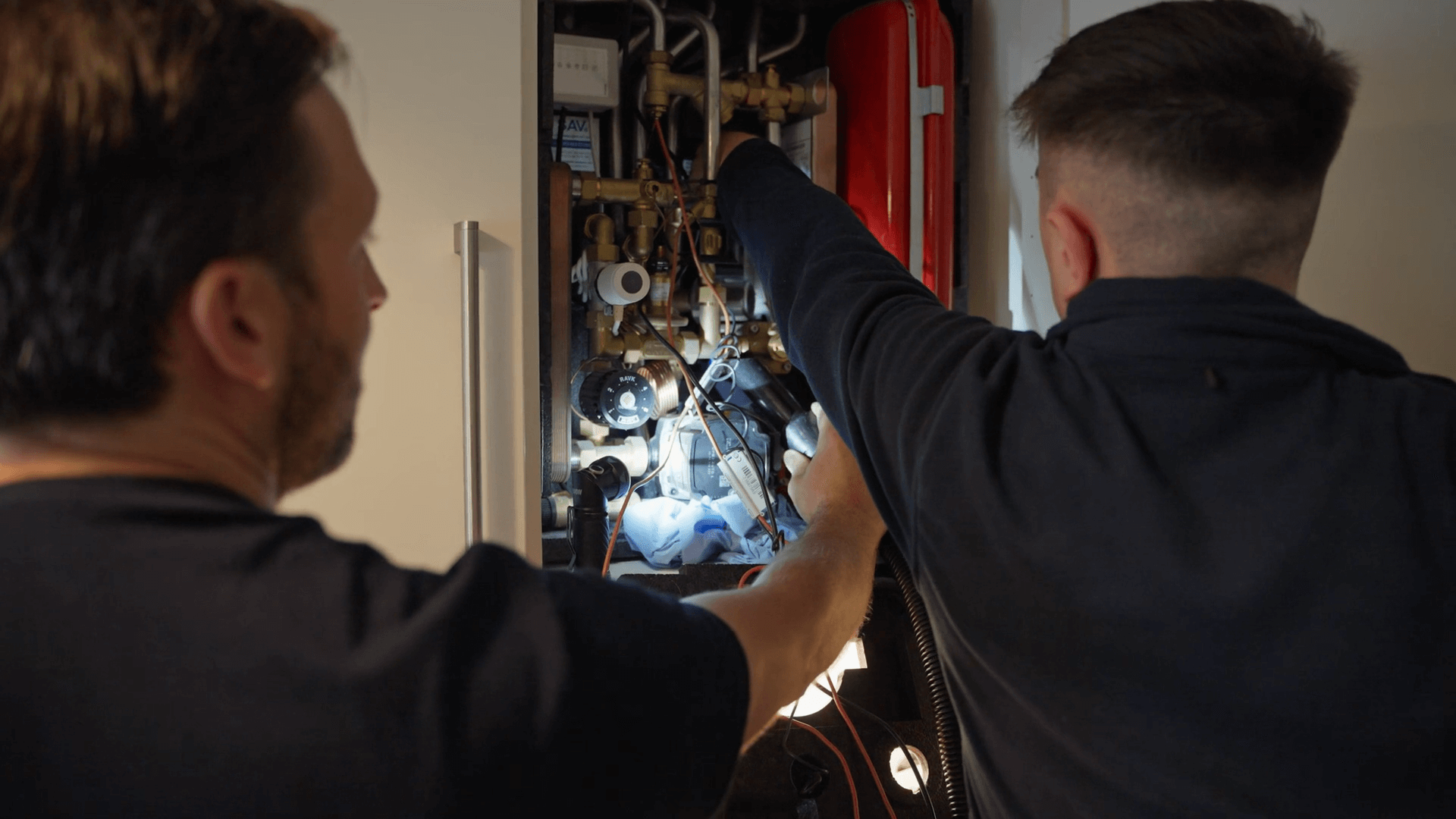 ClwydAlyn plumbers fixing boiler
