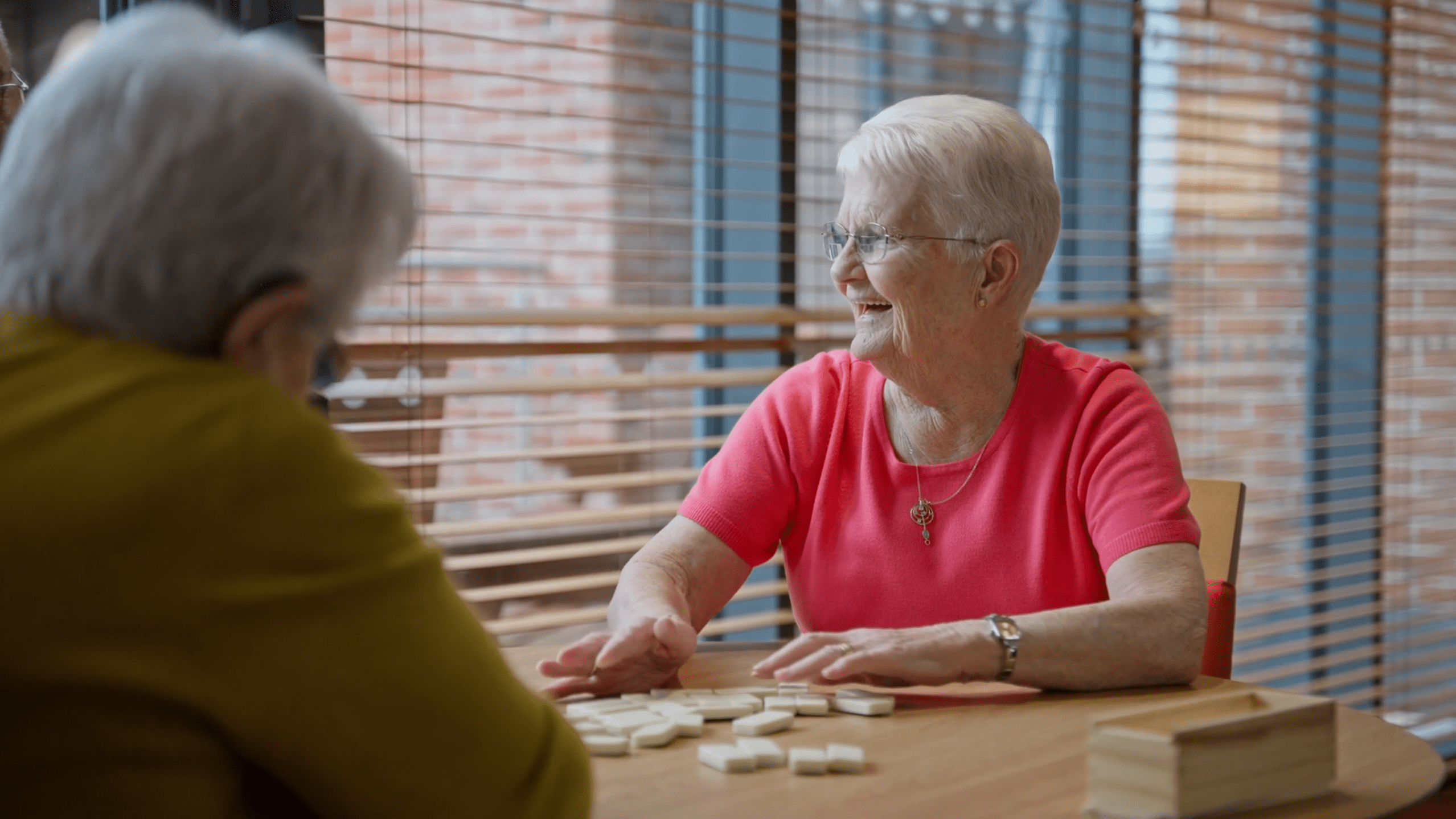 older people playing scrabble in Maes Y Dderwen