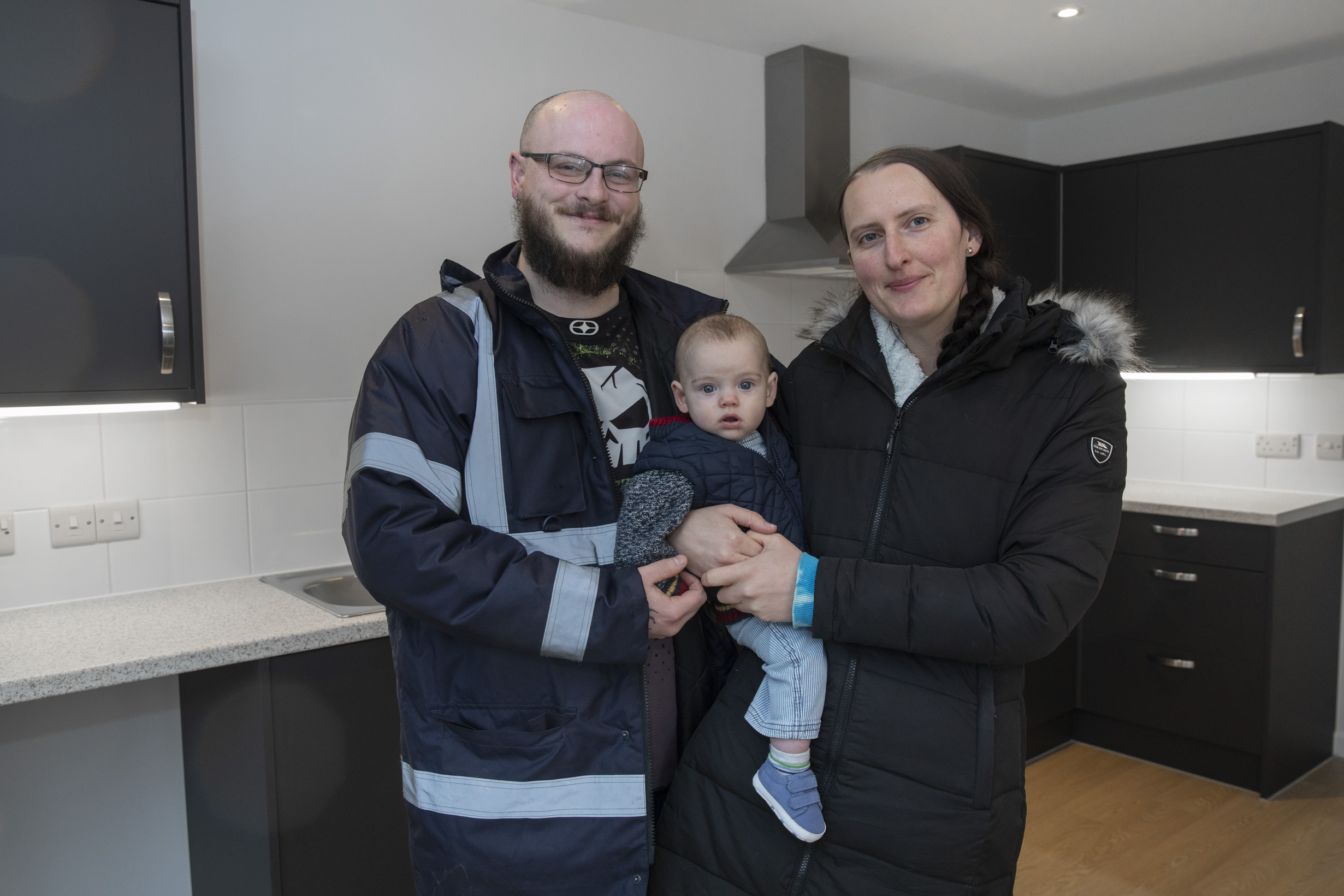 Residents move into newly completed energy efficient affordable homes